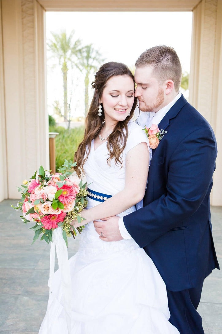 Wedding photo of Easton J. Thomson and his wife, Kamriana